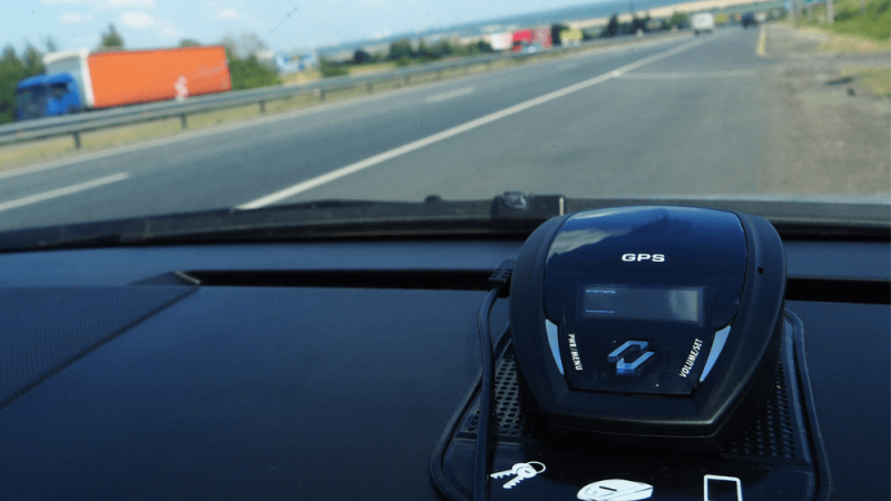view of dash of a car with a radar detector